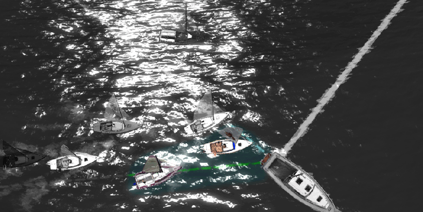 Rule 11 foul during the first race, at the start line, commonly referred to as barging. Sandra, in her Bandit 25, is windward of Daenerys. in her Bandit IF, which is leeward, as she makes contact and pushes Daenerys to the side.